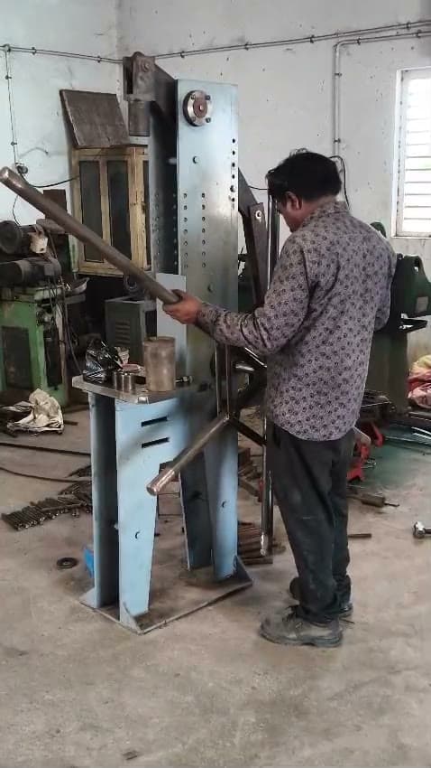 Operator on the Kavan workshop floor — factory footage poster
